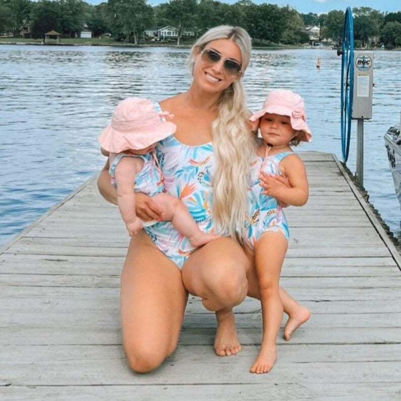 Baddräkt och badbyxa - Mamma, barn och bebis
