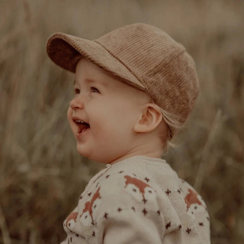 Matchande keps för pappa och barn, tillgÀngliga i vuxen-, barn- och bebisstorlekar.